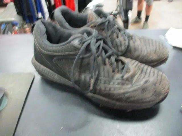 Used New Balance Metal Cleats Size 8.5 - has wear