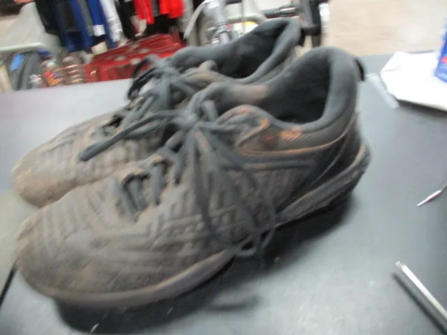Used New Balance Metal Cleats Size 8.5 - has wear