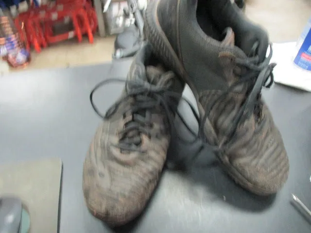 Used New Balance Metal Cleats Size 8.5 - has wear